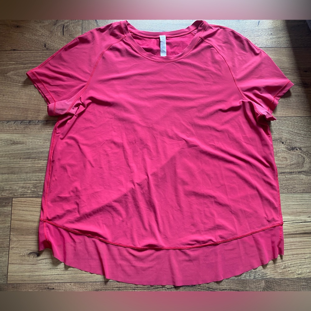 Lululemon Quick Pace Short Sleeve
Fuchsia Pink Size 12 - Picture 3 of 5